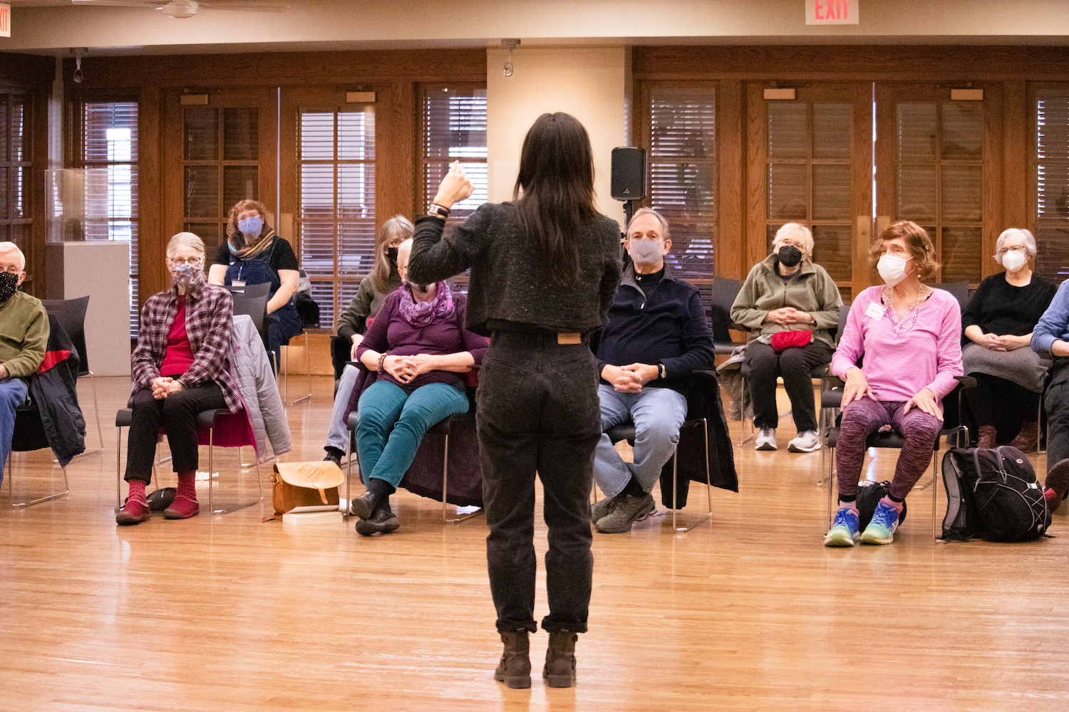 UIDC Director Stephanie Miracle speaking to Iowa City Senior Center partners