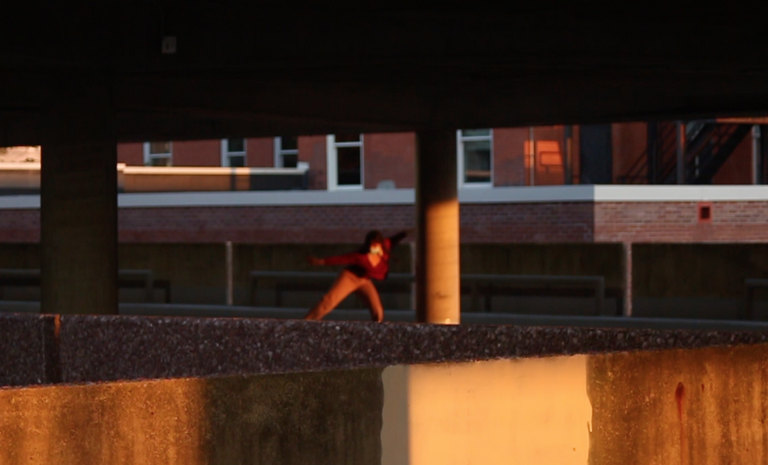 dancer in a parking ramp