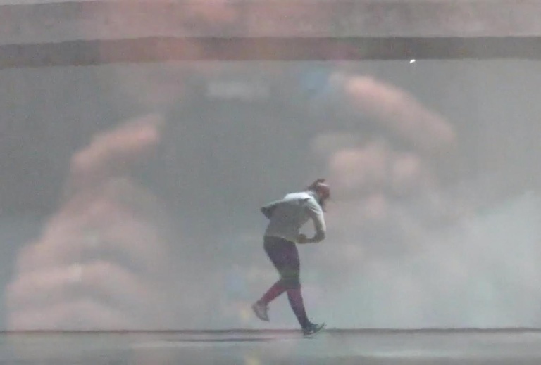 dancer superimposed over an image of someone holding a camera