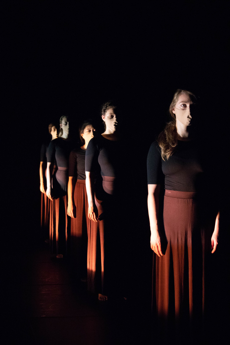 Close up photo of dancers' faces
