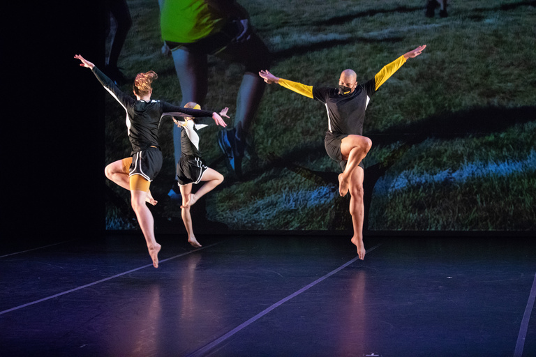 Trio of dancers jumping