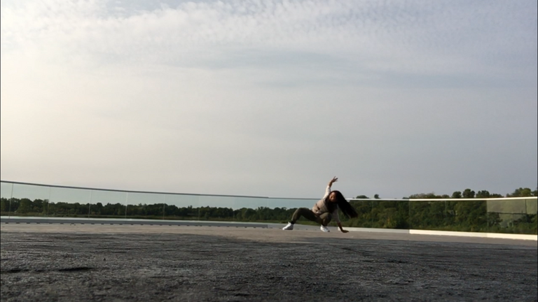 Dancer on rooftop