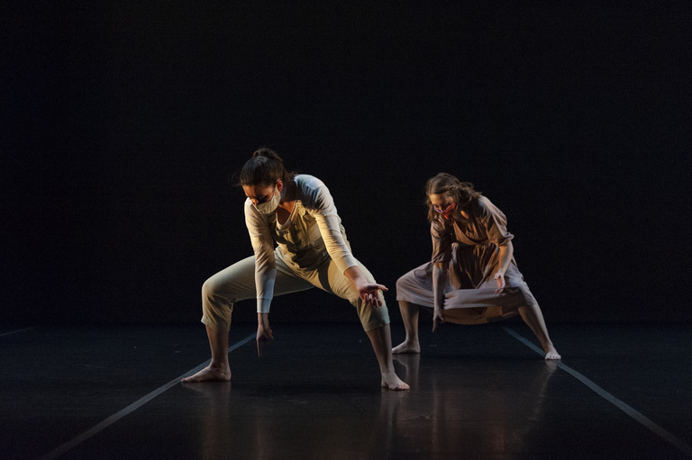 Two dancers performing on stage