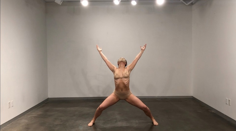 Dancer in performance in an empty room