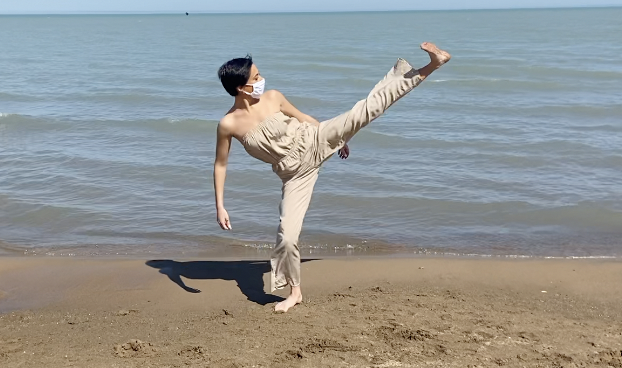 Dancer on the edge of the water