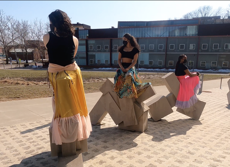 Three dancers on sculptures