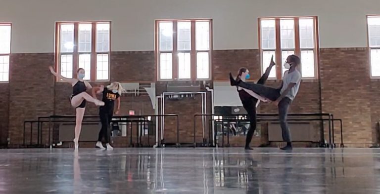 Four dancers performing in Halsey Hall.