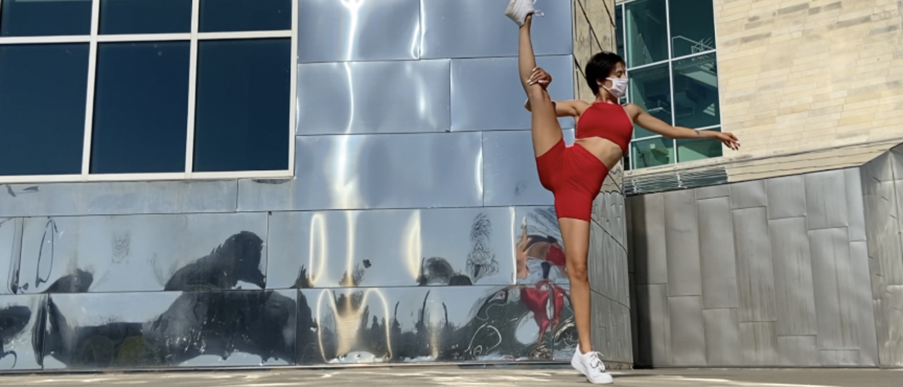 Dancer in red performing outside
