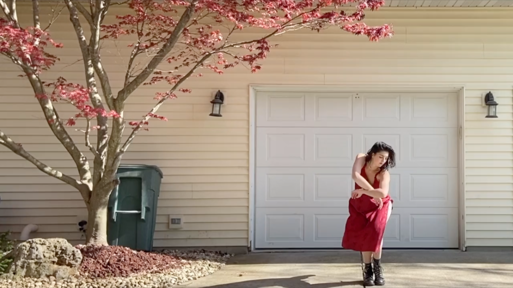 Alyssa Simpson dancing outside