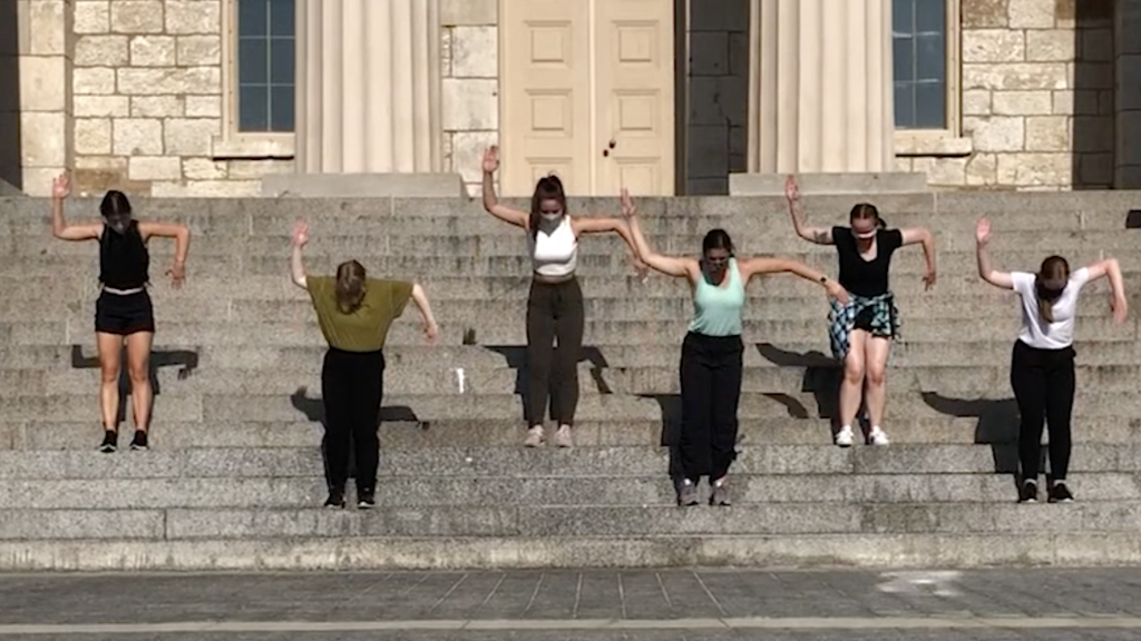 Dancers performing on the steps of the Old Capitol.