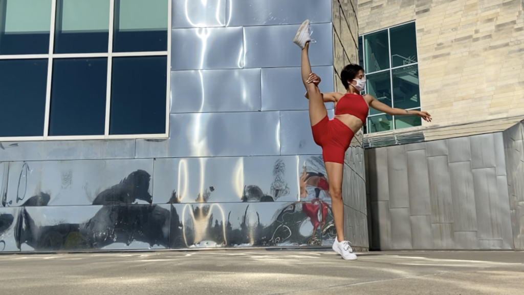 Dancer in red performing outside
