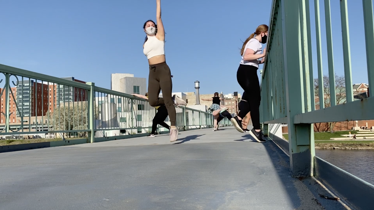 Dancers performing on IMU Foot Bridge