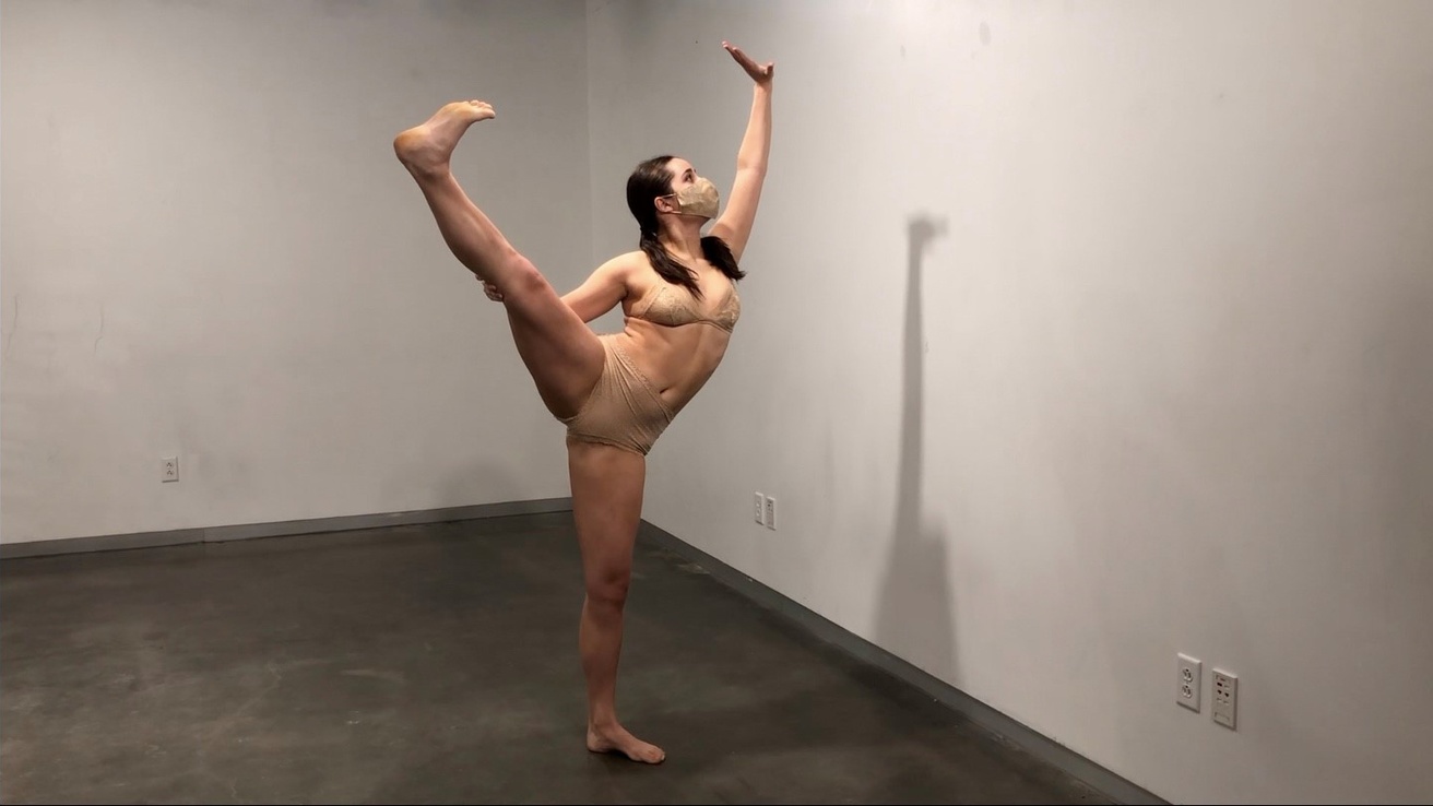 Dancer in performance in an empty room