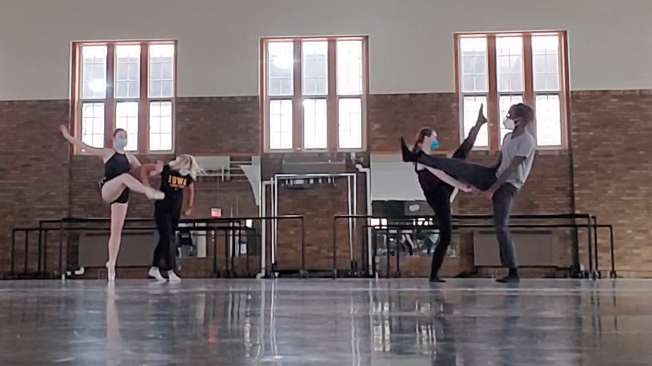 Four dancers performing in Halsey Hall.